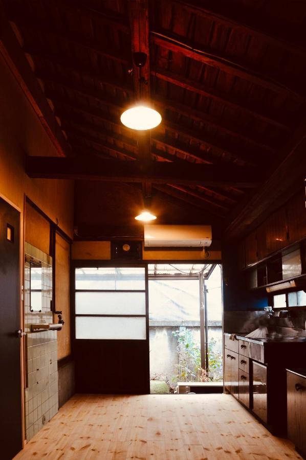 Bakushuku Den Guest House Brew Мацуяма Экстерьер фото
